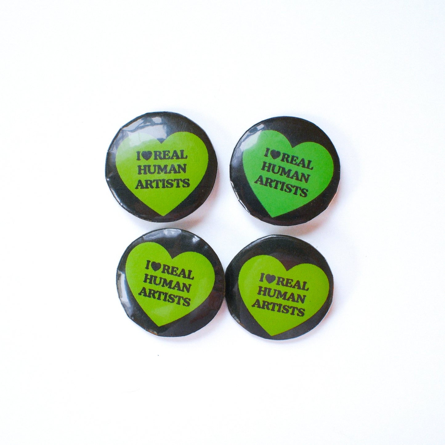 REAL HUMAN ARTISTS PINBACK BUTTON